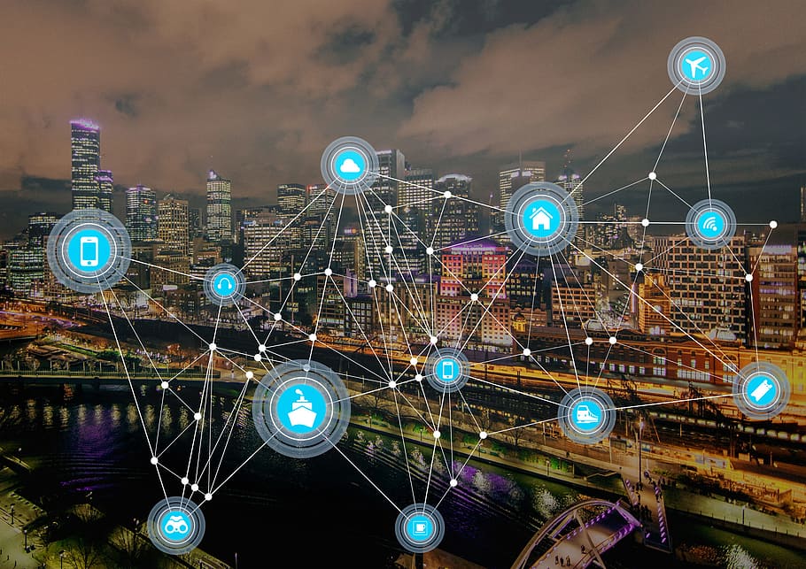 Futuristic smart city skyline overlaid with digital network icons representing autonomous crypto payments; CC0 Public Domain.