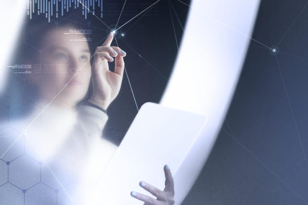 Woman learning how to use ChatGPT effectively on a futuristic digital interface with virtual screen and AI technology graphics
